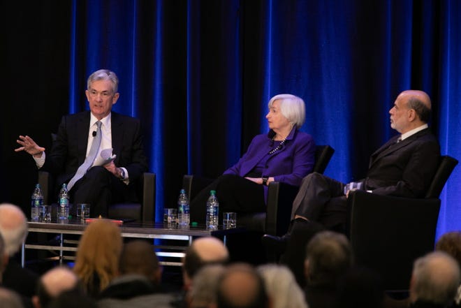 Federal Reserve Chair Jerome Powell, left, and former Fed Chair Janet Yellen participate in a panel discussion at an American Economic Association conference in this undated file photo. Both have publicly stated that inflation will remain higher than 2% for at least another nine to 12 months. Photo credit: Getty Images